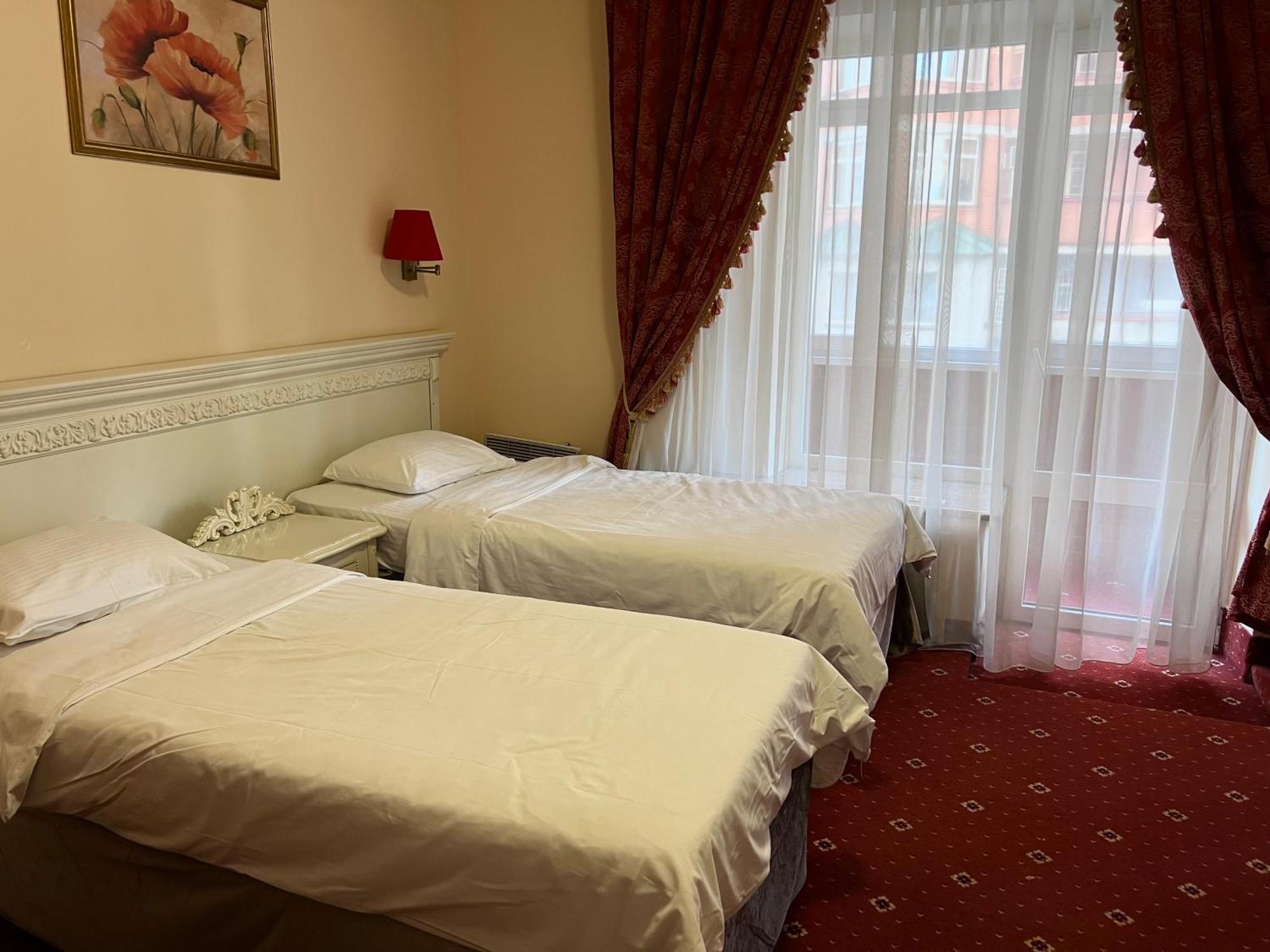 Royal City Hotel Kiev Værelse billede
